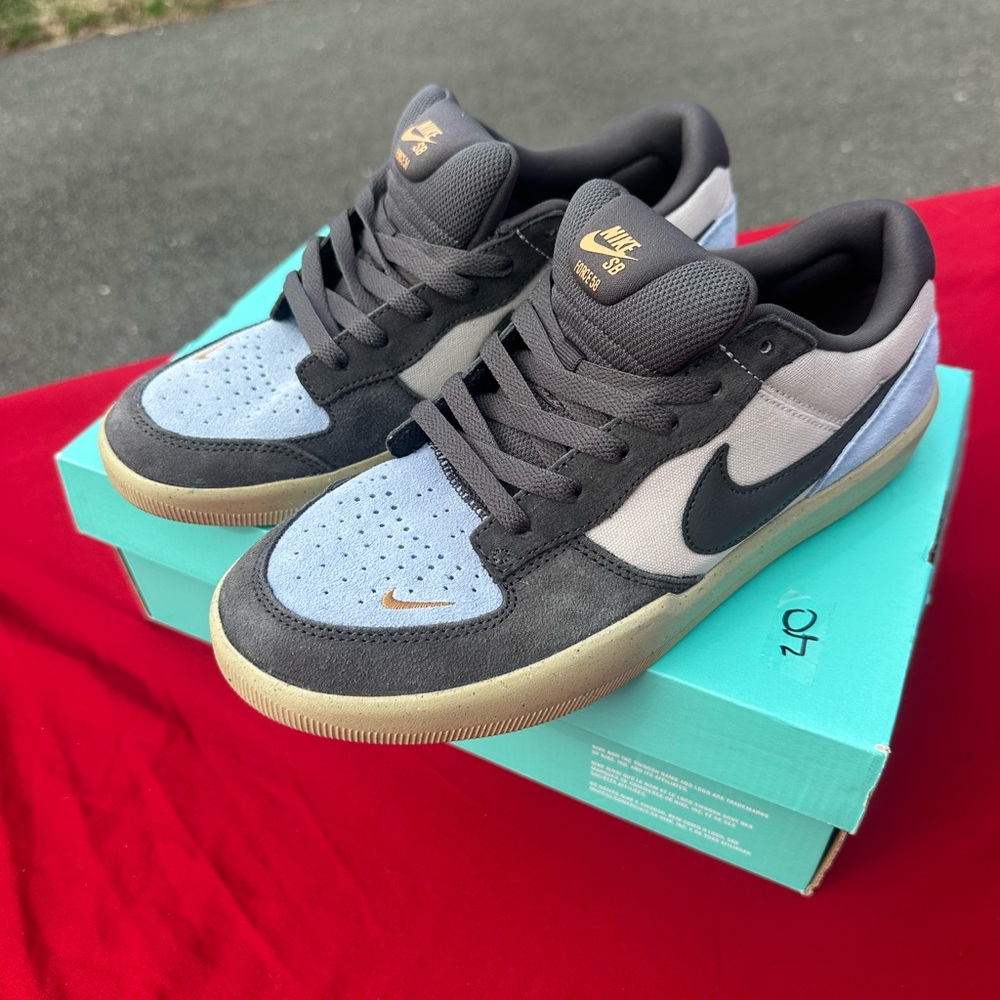 Nike SB Dunk Low - Black, Gray, and Gold